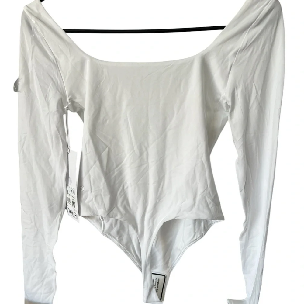 Lululemon Athletica White Fitted Bodysuit Top